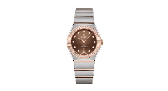 a two-tone watch, white and rose gold, with a brown dial and diamond accents